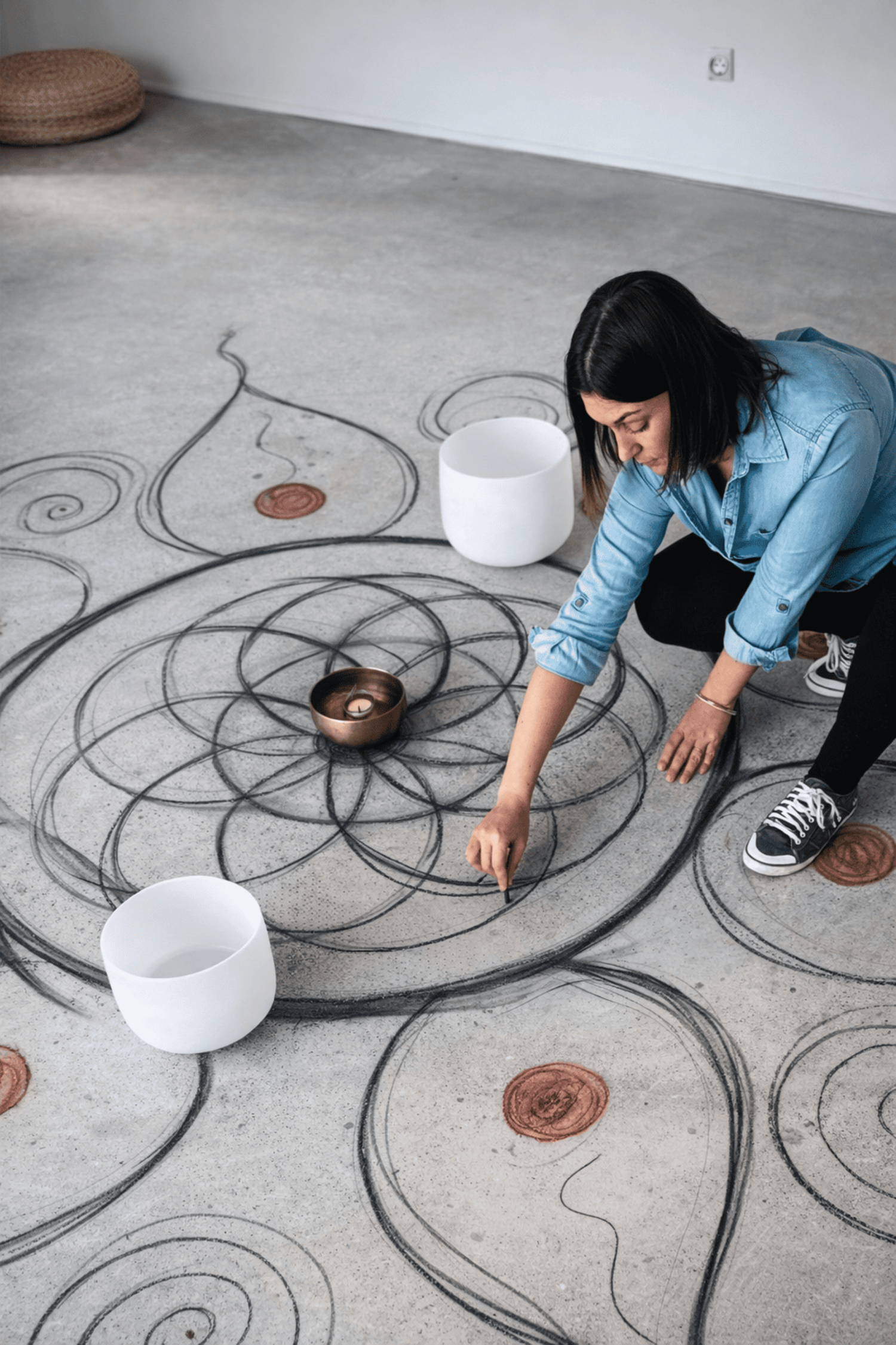 Aline mandala au sol vue du dessus